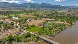 8984 County Road 300, Parachute, CO 81635 - drone / aerial view of a mountainous background