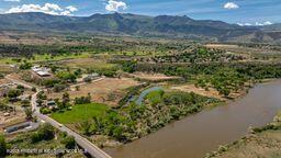 8984 County Road 300, Parachute, CO 81635 - aerial view of a mountain backdrop