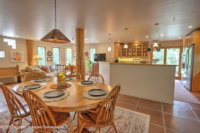 48 Creekside Ct, Glenwood Springs, CO 81601 - dining area featuring healthy amount of natural light, light tile patterned floors, and recessed lighting