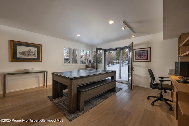 office area with recessed lighting, rail lighting, baseboards, and wood finished floors