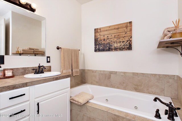 249 Whitehorse Dr, New Castle, CO 81647 - full bathroom with a jetted tub and vanity