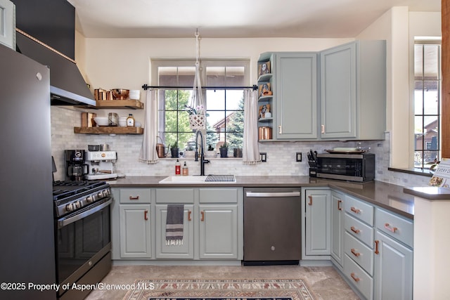 249 Whitehorse Dr, New Castle, CO 81647 - kitchen with appliances with stainless steel finishes, open shelves, and gray cabinets
