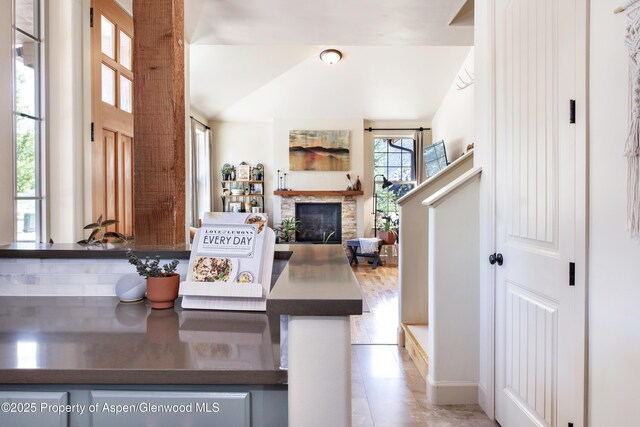 249 Whitehorse Dr, New Castle, CO 81647 - kitchen featuring a fireplace and open floor plan