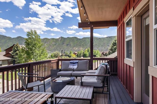 249 Whitehorse Dr, New Castle, CO 81647 - deck featuring an outdoor living space and a mountain view