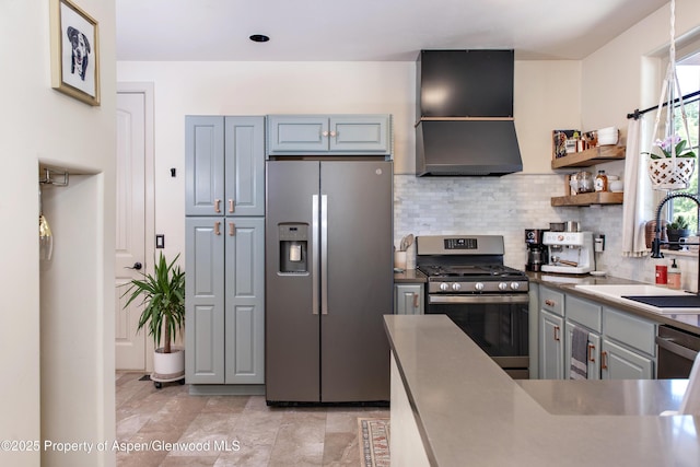 249 Whitehorse Dr, New Castle, CO 81647 - kitchen with appliances with stainless steel finishes, a sink, exhaust hood, decorative backsplash, and open shelves