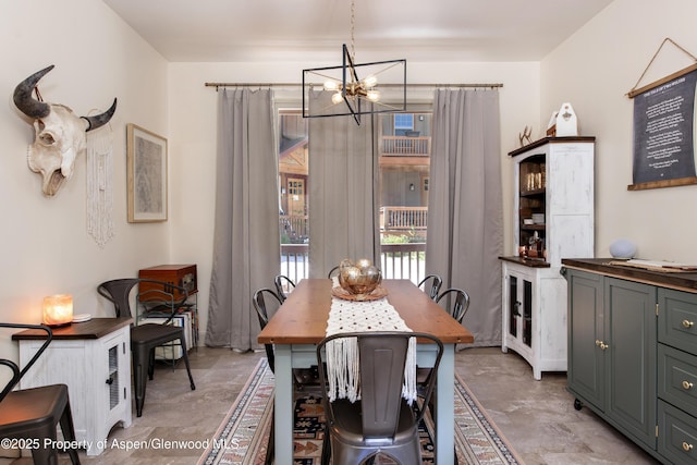 249 Whitehorse Dr, New Castle, CO 81647 - dining area with a chandelier