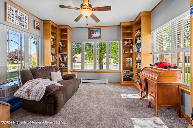 interior space with baseboards, ceiling fan, ornamental molding, carpet flooring, and baseboard heating