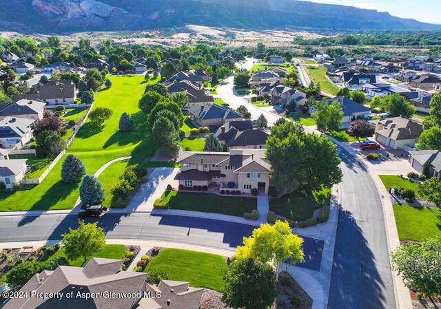 aerial view featuring a residential view and a mountain view