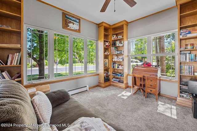 living area with a ceiling fan, baseboards, carpet floors, a baseboard radiator, and crown molding