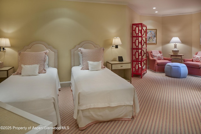 carpeted bedroom with ornamental molding, recessed lighting, and baseboards