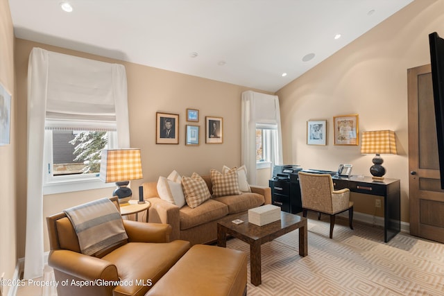 living room with recessed lighting, light carpet, vaulted ceiling, and baseboards