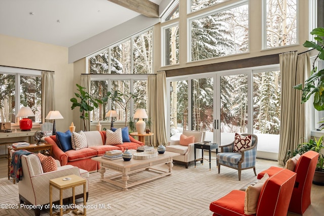 sunroom with beamed ceiling