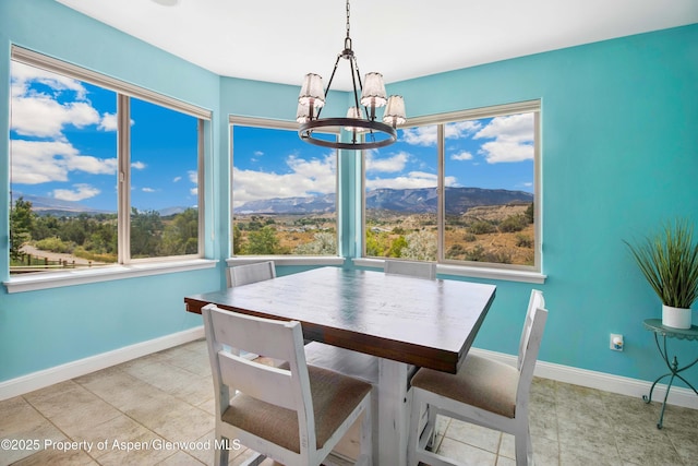 1783 Anvil View Ave, Rifle, CO 81650 - dining room with a chandelier, healthy amount of natural light, and a mountain view