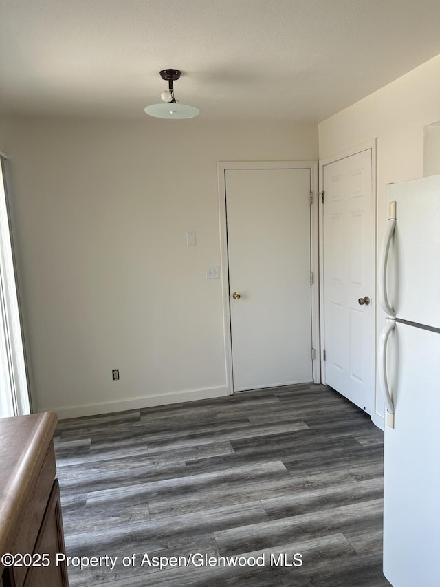 3865 W 6th St, Craig, CO 81625 - unfurnished dining area with dark wood-style floors