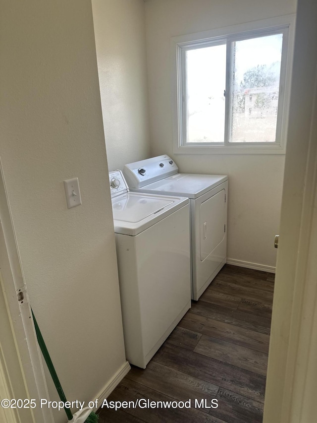 3865 W 6th St, Craig, CO 81625 - washroom featuring washing machine and dryer and dark wood-style flooring