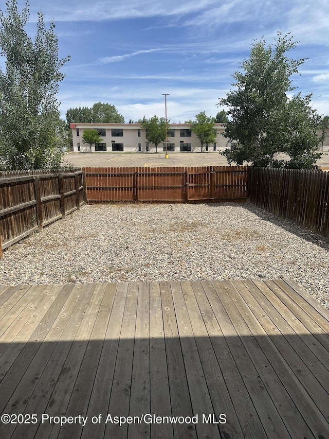 3865 W 6th St, Craig, CO 81625 - wooden terrace with a fenced backyard