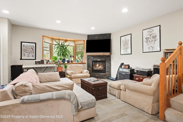 287 Southside Dr, Basalt, CO 81621 - living room featuring a fireplace, recessed lighting, and light wood finished floors