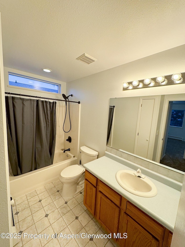 full bathroom with toilet, a textured ceiling, shower / bath combination with curtain, and vanity