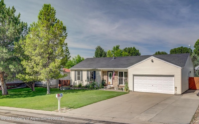 single story home featuring a garage, fence, a front yard, and concrete driveway