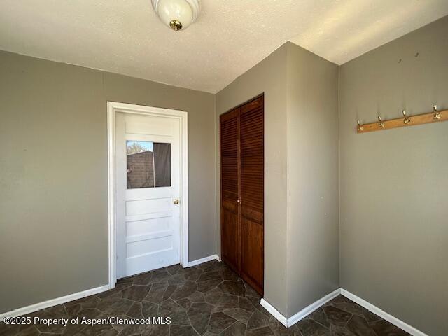 900 Breeze St, Craig, CO 81625 - corridor with baseboards