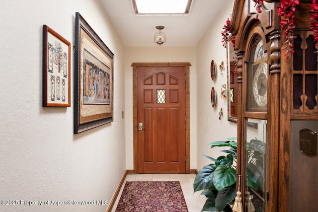 368 Meadow Ln, Glenwood Springs, CO 81601 - doorway featuring baseboards and light tile patterned flooring
