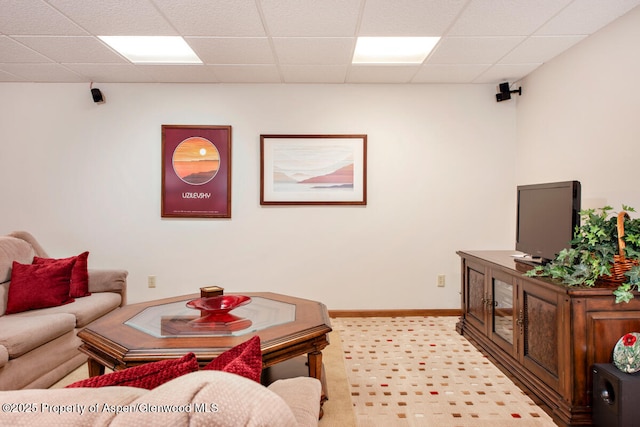 368 Meadow Ln, Glenwood Springs, CO 81601 - living area with a paneled ceiling, light carpet, and baseboards
