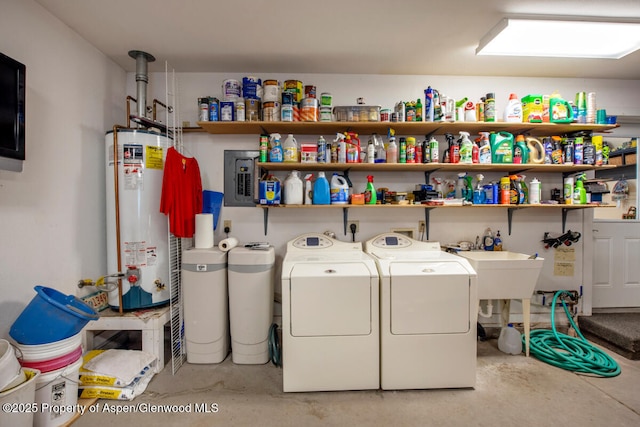 368 Meadow Ln, Glenwood Springs, CO 81601 - laundry area featuring gas water heater, washer and dryer, and electric panel
