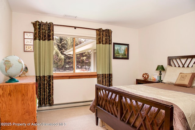 368 Meadow Ln, Glenwood Springs, CO 81601 - carpeted bedroom featuring a baseboard heating unit