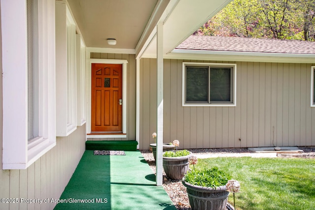 368 Meadow Ln, Glenwood Springs, CO 81601 - entrance to property with roof with shingles and a yard