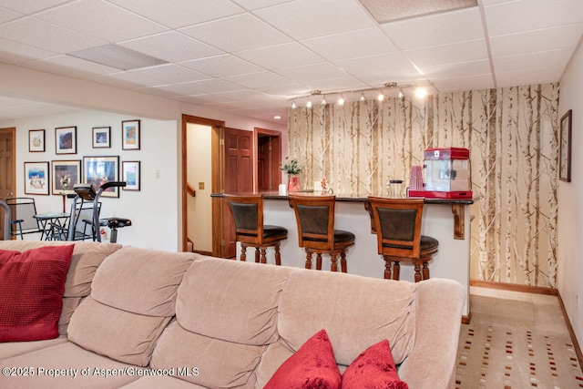 368 Meadow Ln, Glenwood Springs, CO 81601 - living area with wet bar, a paneled ceiling, and baseboards