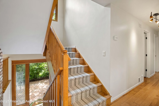912 Red Mountain Dr, Glenwood Springs, CO 81601 - stairs with wood finished floors and baseboards