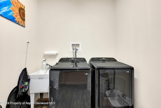 washroom featuring washing machine and dryer