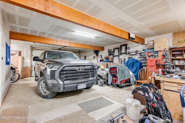 garage featuring a workshop area