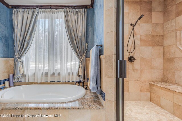 81 River Park Ln, Carbondale, CO 81623 - full bathroom featuring a shower stall and a garden tub