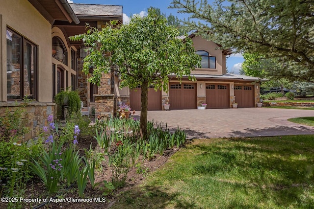 81 River Park Ln, Carbondale, CO 81623 - view of yard featuring an attached garage and driveway