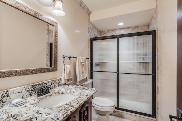 81 River Park Ln, Carbondale, CO 81623 - bathroom featuring toilet, vanity, and a stall shower