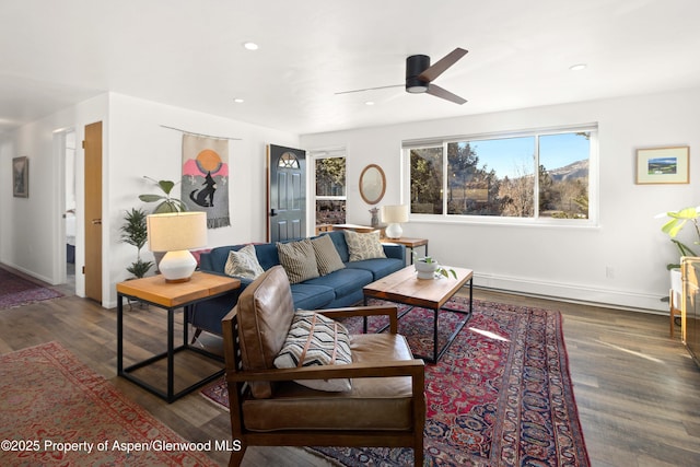 living room with recessed lighting, wood finished floors, a ceiling fan, and baseboards