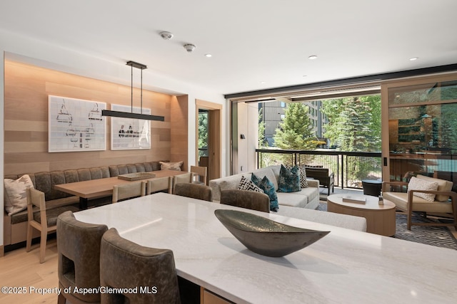 130 Wood Rd Unit 264, Snowmass Village, CO 81615 - dining area featuring expansive windows, light wood-style flooring, and recessed lighting