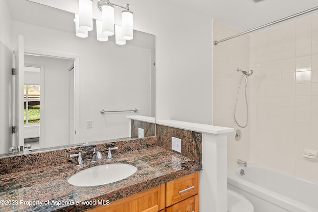 35 Lower Woodbridge Rd Unit B107, Snowmass Village, CO 81615 - bathroom with vanity, washtub / shower combination, and toilet
