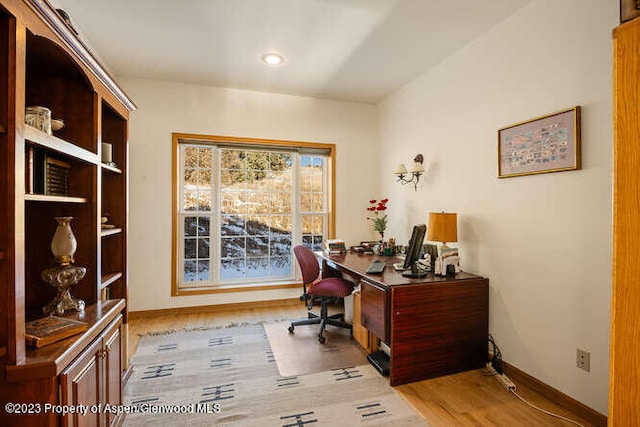 office area with light wood-type flooring