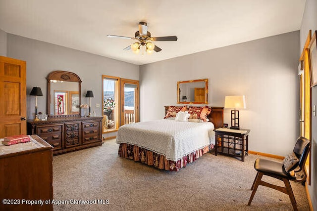 bedroom featuring ceiling fan and carpet floors