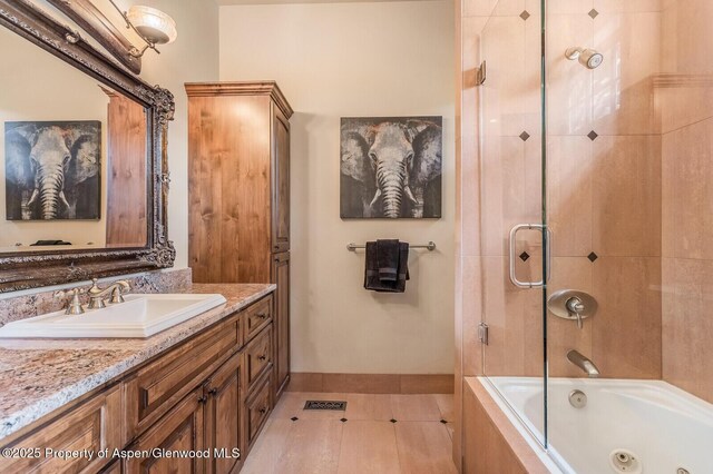 36 Primrose Ln, Carbondale, CO 81623 - full bathroom with vanity, tile patterned flooring, and a combined bath / shower with jetted tub
