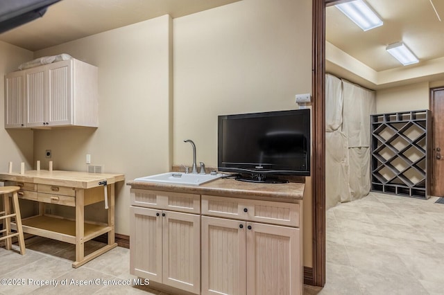 36 Primrose Ln, Carbondale, CO 81623 - kitchen featuring a sink, light tile patterned flooring, and light countertops