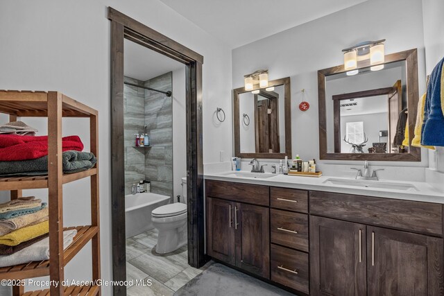 510 S Wildhorse Dr, New Castle, CO 81647 - full bathroom with double vanity, toilet, and bathtub / shower combination