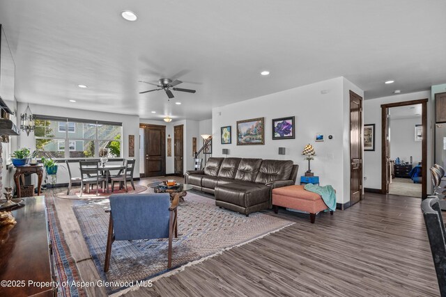 510 S Wildhorse Dr, New Castle, CO 81647 - living area featuring recessed lighting, baseboards, a ceiling fan, wood finished floors, and stairway