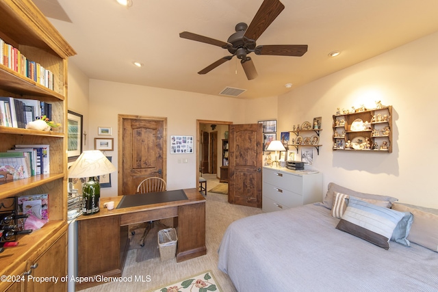 carpeted bedroom with ceiling fan