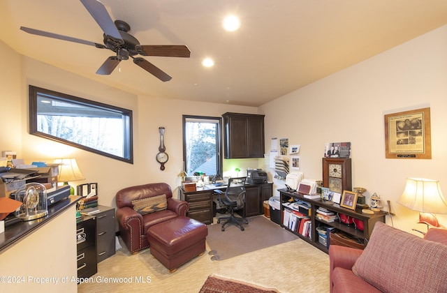 office with light colored carpet and ceiling fan