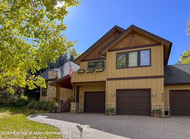 craftsman-style house featuring a garage