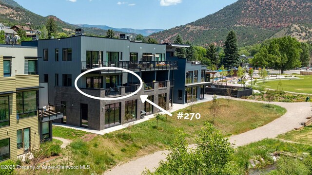 22860 Two Rivers Rd # 270, Basalt, CO 81621 - view of building exterior featuring a mountain view