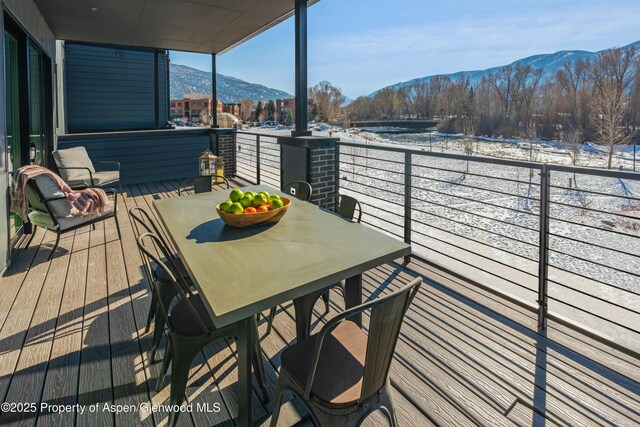 22860 Two Rivers Rd # 270, Basalt, CO 81621 - balcony with a mountain view and outdoor dining area